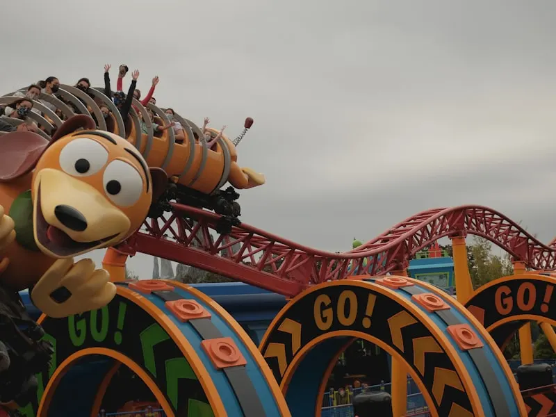 Slinky Dog Dash ride vehicle and track with Toy Story-themed structures